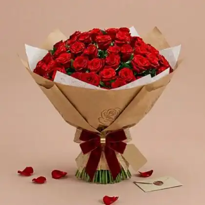 A magnificent 100 roses bouquet featuring deep red petals and lush greenery, perfect for a romantic gesture.