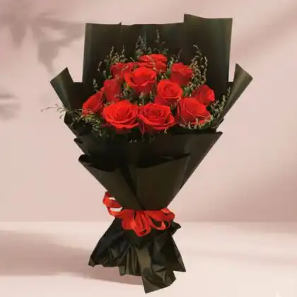 A stunning arrangement of luxury 12 red roses bouquet for gift, elegantly wrapped with a premium ribbon.
