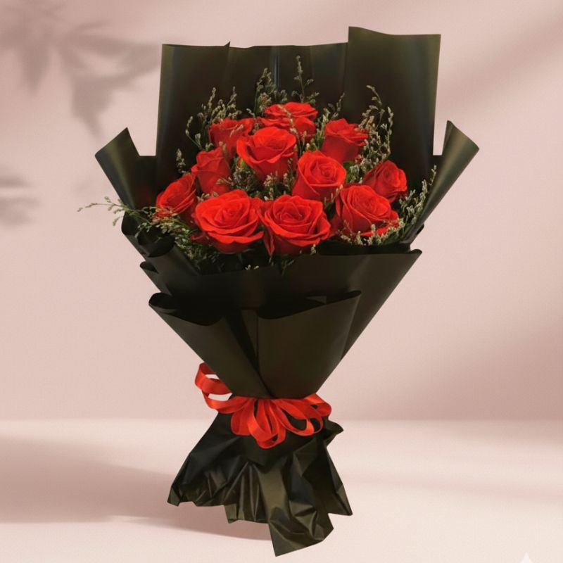 Luxury 12 Red Roses Bouquet For Gift 1 A stunning arrangement of luxury 12 red roses bouquet for gift, elegantly wrapped with a premium ribbon.