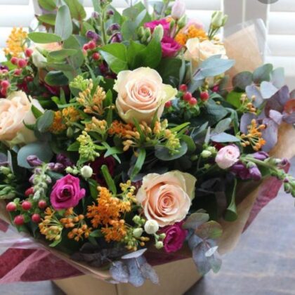 Buy hand tied bouquet of flower wrapped tissue paper delivery UK