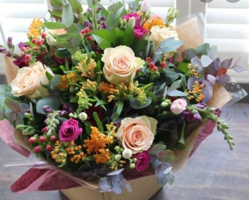 Buy hand tied bouquet of flower wrapped tissue paper delivery UK