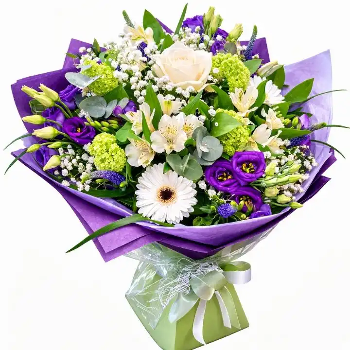 Elegant White Rose & Gerbera Bliss Bouquet 1 A beautifully hand-tied floral arrangement of crisp white rose and gerbera bouquets set against a soft background.