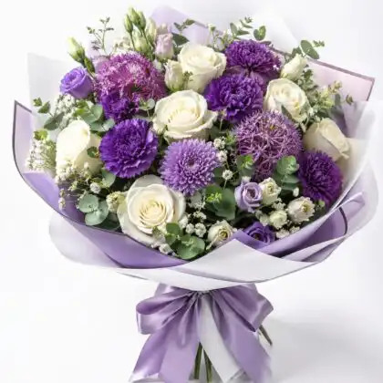 white rose and purple carnation bouquet​