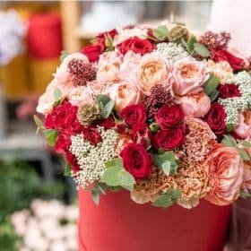 Red rose bouquet with carnations, Snowberry