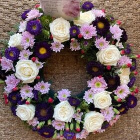 Elegant Purple and White Funeral Wreath