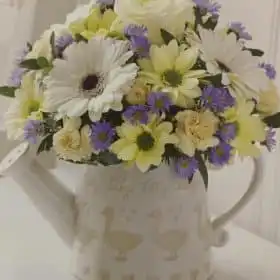 Watering can with flowers Daisies, Rose