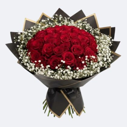 Hand-tied 50 red rose bouquet accented with white gypsophila in a premium black and gold wrap.
