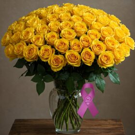 Large yellow rose in vase
