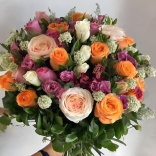 Surprise someone special with our Lady’s Day Flower Delivery in London. This beautiful bouquet features roses, lilies, and seasonal blooms, arranged to perfection. Ideal for gifting on Lady’s Day or other special occasions, it’s delivered with care, and you can track your order in real-time. Enjoy a 10% discount on all purchases and guaranteed on-time delivery.