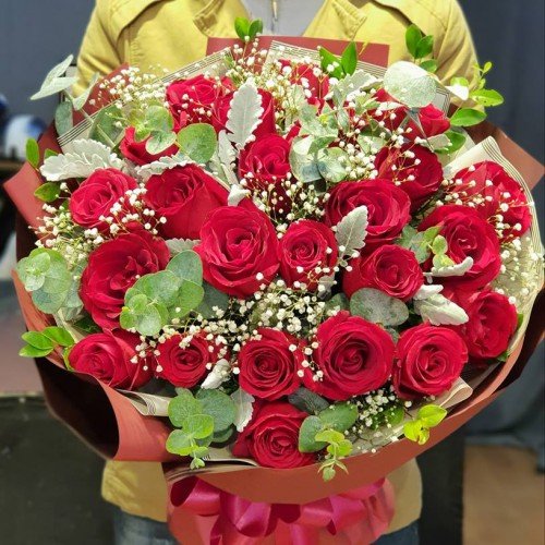 Two Dozen Luxury Red Roses Bouquet 1 24 Red Roses Bouquet featuring two dozen premium ruby-red blooms and lush greenery, perfect for anniversaries or expressing deep affection.