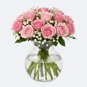 Fresh Pink Rose hand tied in a Glass Vase