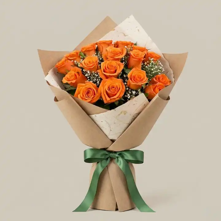 Vibrant Orange Rose Bridal Bouquet 1 Hand-tied orange rose bridal bouquet with fresh green leaves arranged for a vibrant wedding theme.