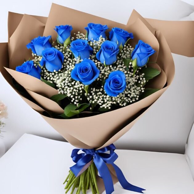 12 Blue Rose Mother's Day flower bouquet delivery, hand tied in a woman’s hand.