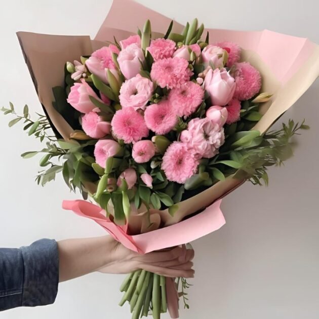 Pink Spring Flower Bouquet Mother's Day Gift in a man's hand, showcasing fresh flowers