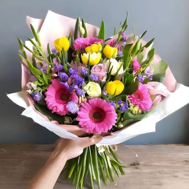 Spring Flowers for Mother's Day Next Day Delivery Hand Tied in Women's Hand