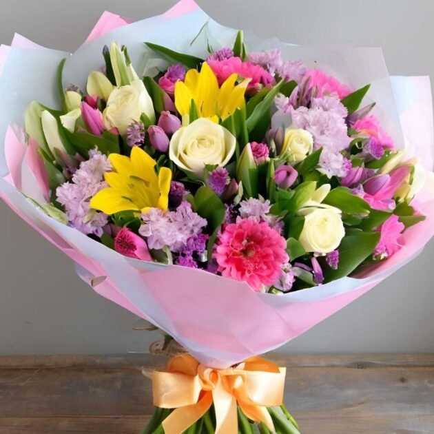 Hand Tied Spring Flowers for Mother's Day Next Day Delivery in Women's Hand