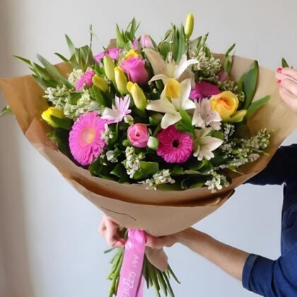 Fresh spring flowers for Mother's Day gift, including tulips, daffodils, and lilies