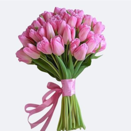 A stunning Bouquet of Pink Tulips tied with a matching silk ribbon, perfect for a romantic gesture or seasonal home decor.