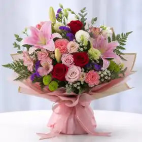 Gerbera Daisy and Rose Arrangement with soft Carnations