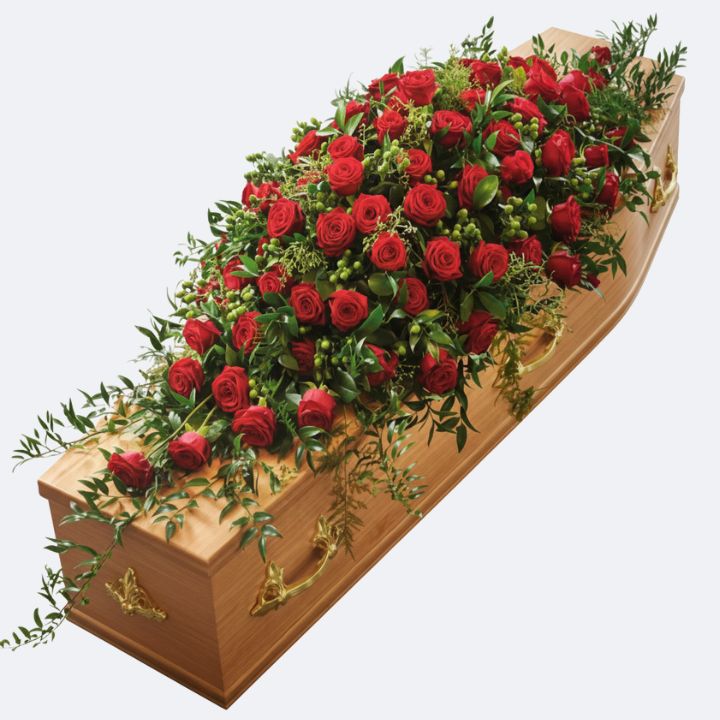 Funeral Spray for Coffin with Deep Red Roses 1 Natural fresh red roses arranged as a funeral spray for coffin with green foliage.