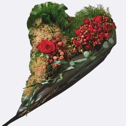 Heart Shaped Funeral Tributes featuring a mix of deep red roses, vibrant red berries, and textured green moss, suitable for expressing sympathy and love at a memorial service.