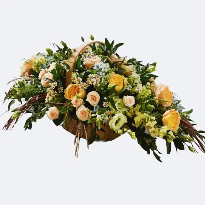 Rustic Peach Wicker Basket Funeral Flower 1 Large, elegant Basket Flower Arrangement for Funeral featuring soft peach roses, vibrant yellow blooms, and fresh green foliage presented in a natural wicker container.