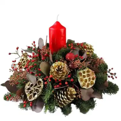 Classic green and red Christmas table wreath with candles, pine cones, and berries for the holiday season centerpiece.