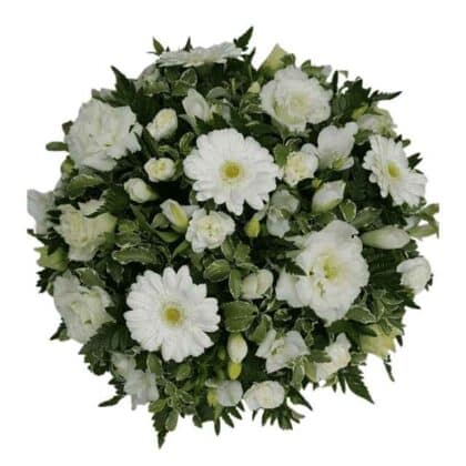 A round bouquet of white flowers including gerbera daisies, carnations, and buds with green leaves.
