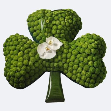 Shamrock Funeral Tribute – A striking green floral arrangement perfect for a heartfelt sympathy display.