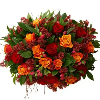 Luxury autumn roses hand tied bouquet with vibrant red/orange roses, dark red hypericum berries, and rich green foliage.