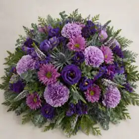 Vibrant Purple and Thistle Posy of Flowers for a Funeral