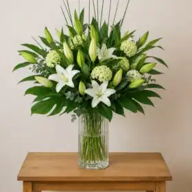 Elegant White Lilies in a Vase with Fresh Hydrangeas